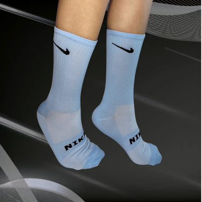 Medias deportivas NK, color azul claro