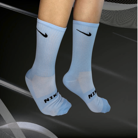 Medias deportivas NK, color azul claro